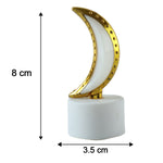 A single golden crescent moon LED tealight with dimensions of 8 cm height and 3.5 cm width.