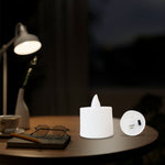 Blue LED tea light candles arranged on table for home decoration