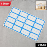 A single sheet of blue-bordered rectangular label stickers with blank white centers is displayed on a gray surface.
