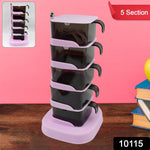 Space-saving rotating spice organizer with five transparent jars in a modern kitchen setting.