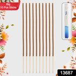 Ten brown incense sticks on a floral background with a blue and white box in the corner.