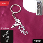 Close-up of spiritual Krishna flute shaped metal keyring