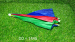 A folded, colorful red, yellow, green, and blue umbrella hat lies on vibrant green artificial grass.
