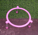 Stainless steel matka stand with a fruit basket placed on top.