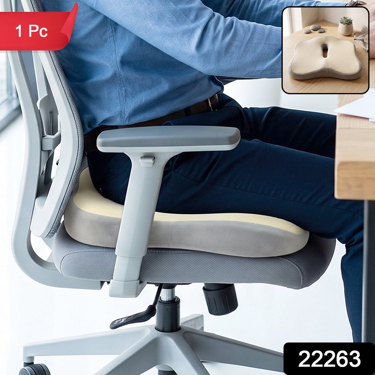 A person sitting on a grey office chair with a beige and grey ergonomic seat cushion, with a red '1 Pc' label and black