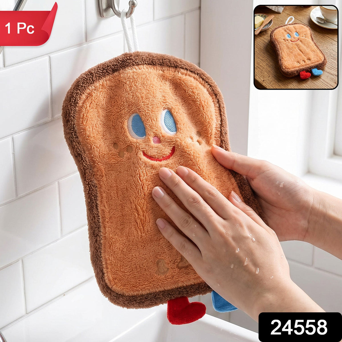 A person's hands gently patting a brown cartoon bread slice towel hanging above a sink,