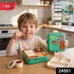 A child smiles while eating from a green dinosaur lunchbox, with an inset showing the full set of components.