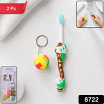 Close-up of colorful kids toothbrush with soft bristles and small toy ball