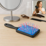 White Scalp Massager Comb with soft, ball-tipped bristles for gentle detangling.