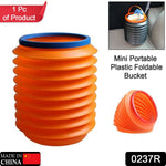 An orange foldable bucket with a blue rim is shown next to a smaller, collapsed orange bucket and an inset of it in a car.