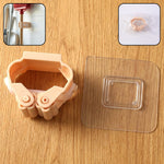 Wall mounted mop and broom holder clip showing strong adhesive grip