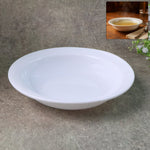 Deep round white curry bowl with glossy finish on white background