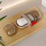 Clear plastic travel soap box with a secure lid, ideal for carrying solid soaps on trips.