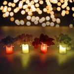 Set of four LED mood lights illuminating a bedroom at night, creating a cozy ambiance.