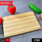 Natural wood cutting board for kitchen prep.