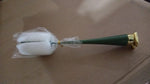 Ergonomic long handle bottle brush demonstrating its reach into a narrow-necked bottle.