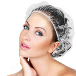 A person wearing a VelvaBloom disposable shower cap, demonstrating effective hair protection.