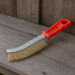 Side view of the stainless steel wire hand brush, showing its curved design.