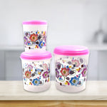 Three plastic storage containers, ideal for organizing items in a home or office setting.