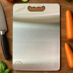 Gleam metallic finish stainless steel cutting board with convenient handle
