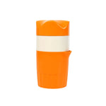 Manual orange juice maker with an angled spout for drip-free pouring.