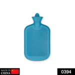 Green rubber hot water bag for muscular pain relief