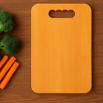 Chopping board made of natural wood with groove for containing juices