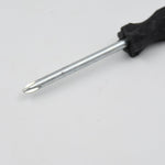 Set of small tools including the XcelGrip Phillips screwdriver.