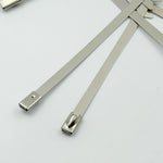 Comparison of stainless steel cable ties with plastic alternatives, emphasizing superior strength and longevity.