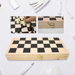 A game in progress on the elegant folding wooden chess set, showing the chessmen on the board.