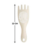 White rice sieve with straining spoon feature, ensuring no spillage.