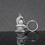 Elegant Shivling keychain with snake design in silver metal