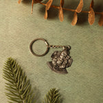 Side view of Lord Ganesha silver metal keychain