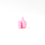 Side profile of pink silicone hand clip wall holder for organizing cables