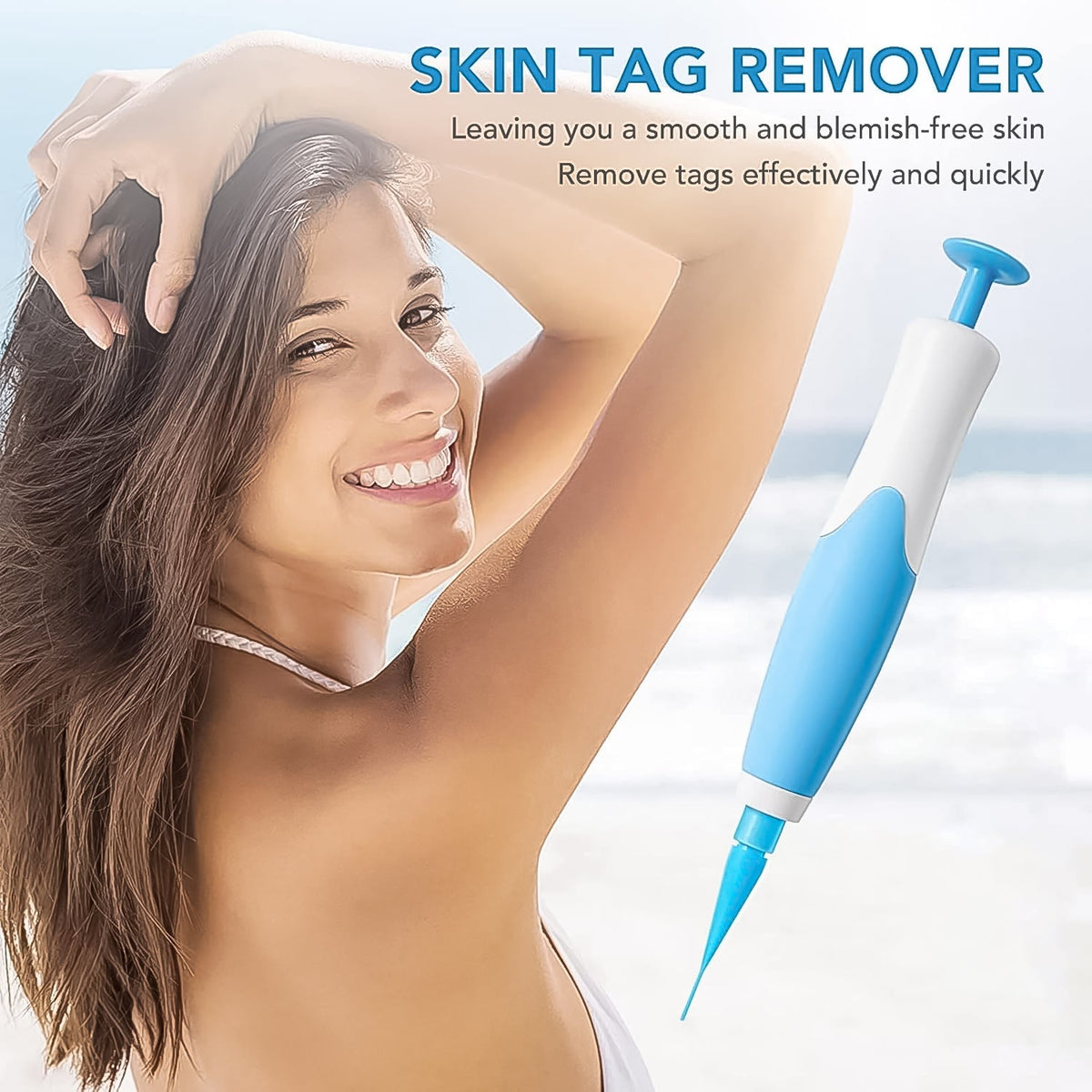 Smiling woman with long brown hair holding the blue and white skin tag remover tool on a beach.