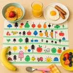 Kids placemat featuring bright cartoon design and fruits