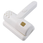 Dust Zap USB Dust Mite Controller vacuuming a mattress
