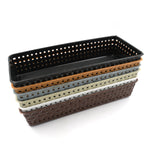 A stack of six rectangular plastic baskets in various colors on a white background.