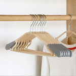Ergonomic design of the PP clothes hanger for wrinkle-free storage.