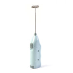 Portable electric milk whisk frothing milk for coffee