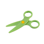 Colorful plastic safety scissors cutting craft paper safely