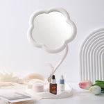Flower vanity mirror with jewelry and small accessories stored neatly in base tray