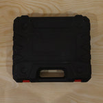 Cordless drill tool kit case on wood surface