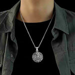Side view of the Hanuman pendant, highlighting its craftsmanship.