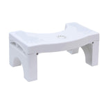 The toilet squat stool folded flat, demonstrating its compact size for easy storage.