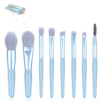 The full 8-piece mini makeup brush set with its compact travel case, ready for use.