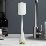 Silicone bottle cleaning brush with its flexible head conforming to bottle contours for thorough cleaning.