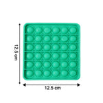 Close-up of popping bubbles on silicone Pop It toy