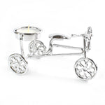 Decorative cycle tealight stand with candle enhancing living space ambiance