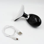 The portable Neck Face Massager shown with its USB charging cable.